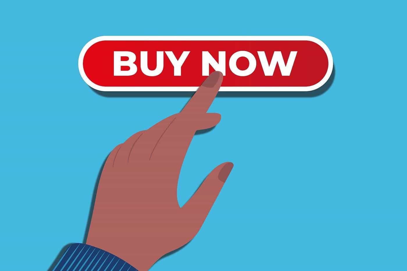 A hand pressing a red Buy Now button