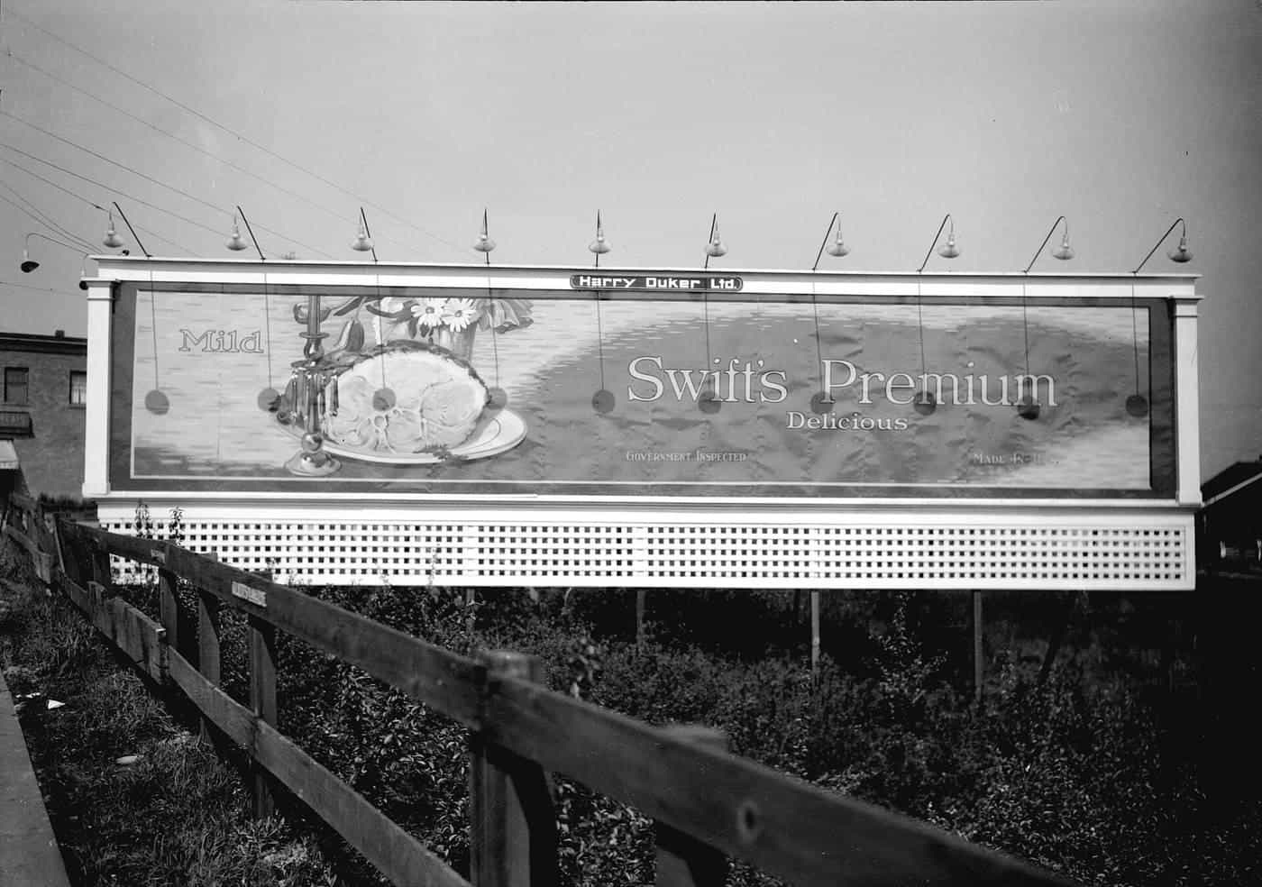 A vintage roadside billboard advertisement
