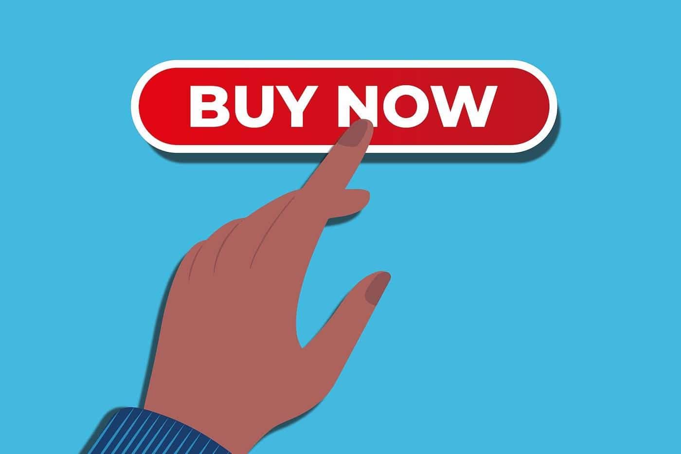 A hand pressing a red Buy Now button